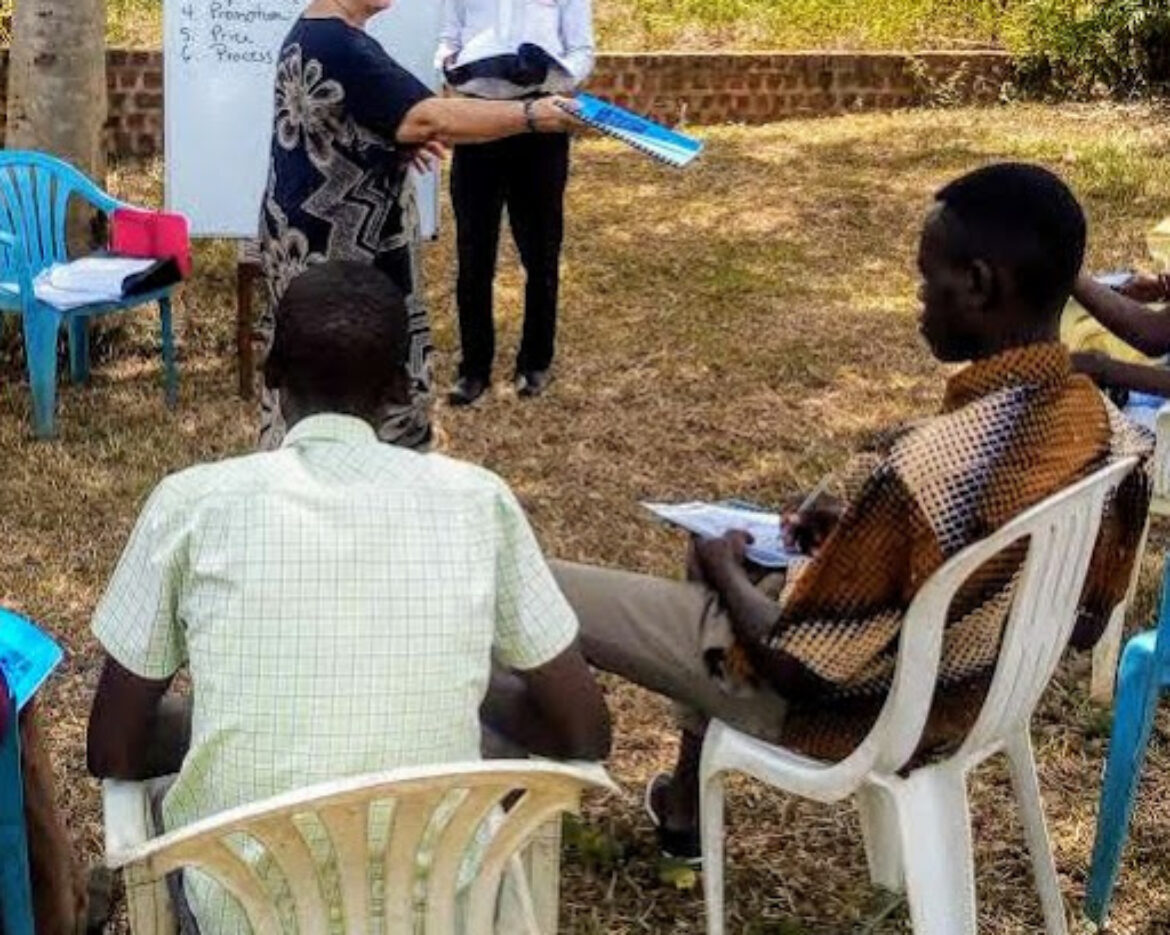 Handing-out-workbooks-1